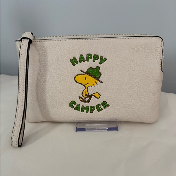 Coach Handbags - Coach x Peanuts Happy Camper Woodstock Wristlet